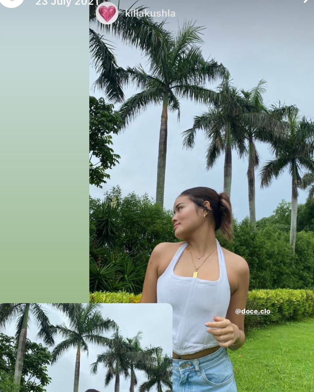 A customer in the white doce corduroy corset top outdoors under palm trees